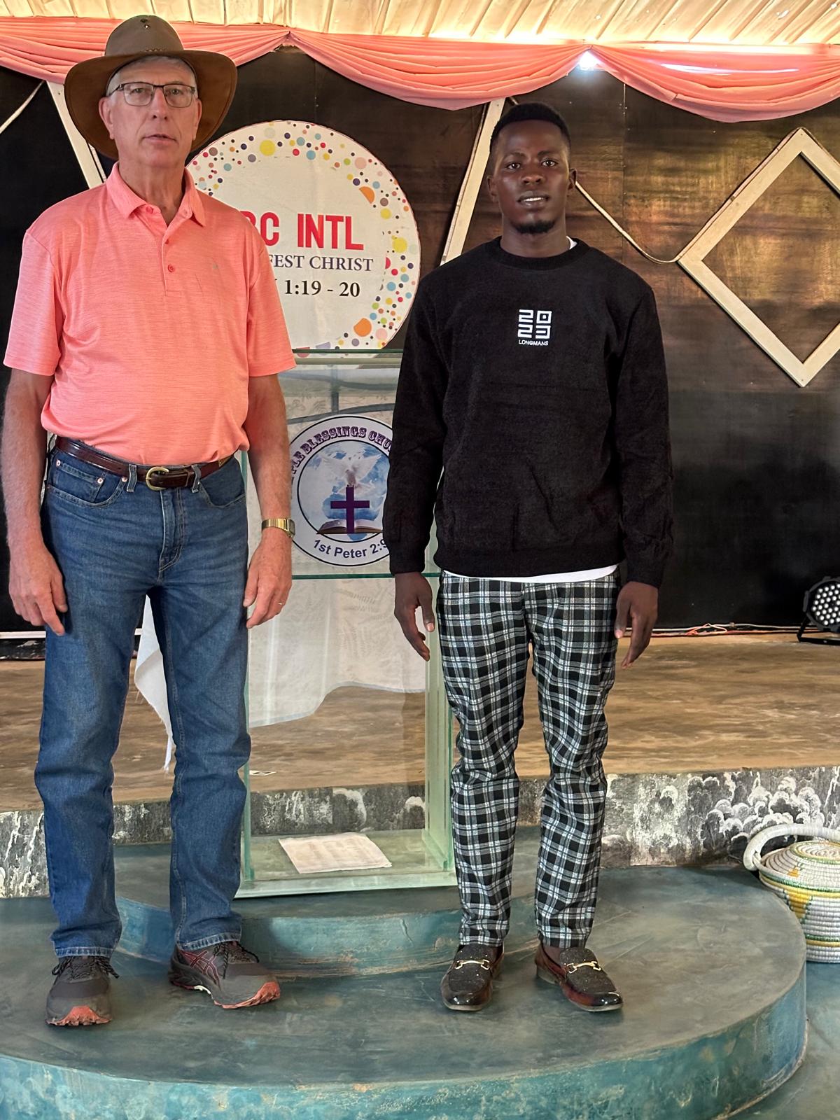 Hope Caring CBO founders Randall and Ssozi at a community event